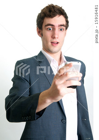 surprised man with mobile phone 15916481