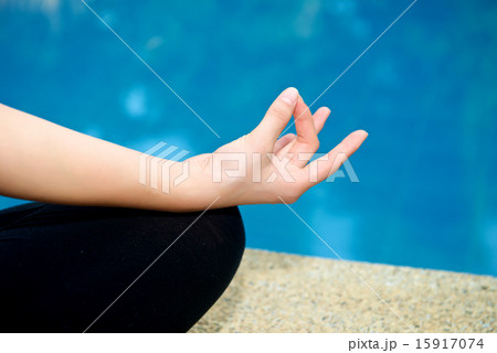 Yoga Meditation hand by pool 15917074