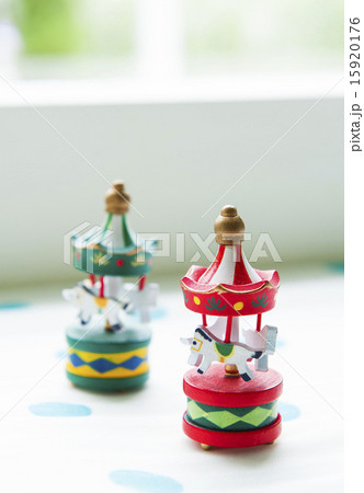 Two wooden toy carousel 15920176