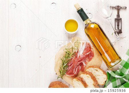 Prosciutto, wine, ciabatta, parmesan and olive oil Prosciutto, wine, ciabatta, parmesan and olive oil 15925936