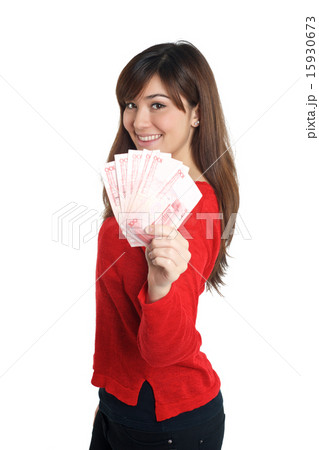 Asian girl holding a few bills of Chinese money 15930673