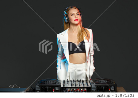 Beautiful blonde DJ girl on decks - the party, 15971203