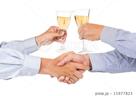 Men shaking hands and toasting white wine Men shaking hands and toasting white wine 15977823
