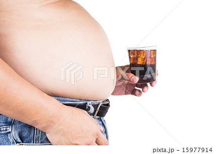 Man with big belly holding a glass of fizzy soda Man with big belly holding a glass of fizzy soda 15977914