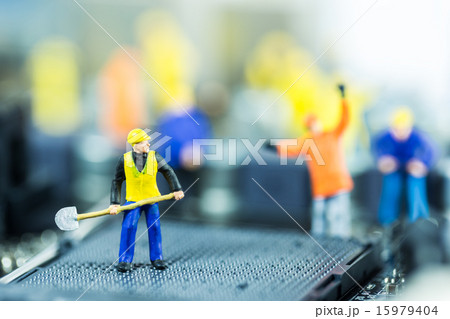 Team of engineers repairing circuit mother board 15979404