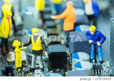 Team of engineers repairing circuit mother board. 15979429