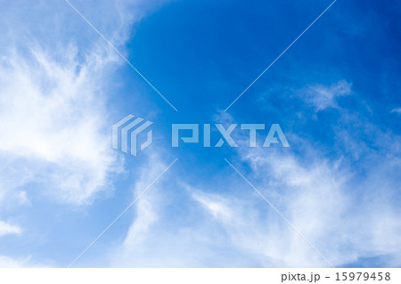 white fluffy clouds in the blue sky 15979458