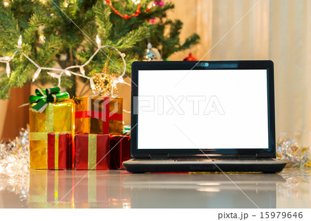 laptop with gift box and christmas lights 15979646