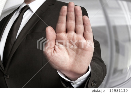 Hand stop shown by businessman Hand stop shown by businessman 15981139