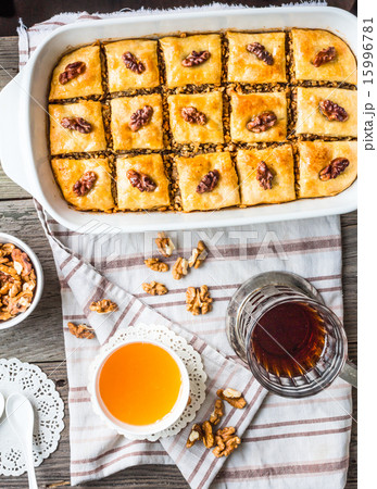 sweet baklava with honey and nuts, rustic sweet baklava with honey and nuts, rustic 15996781