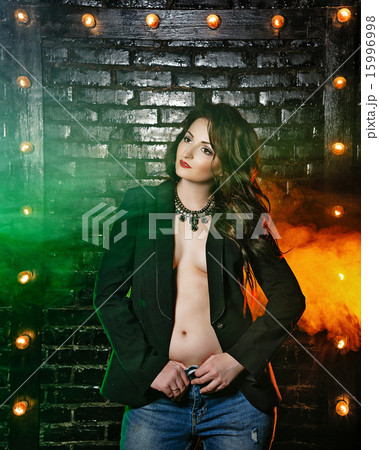 Brunette in jacket and jeans 15996998