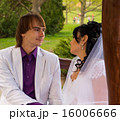 Couple love bride and groom posing sitting on wood 16006666