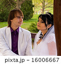 Couple love bride and groom posing sitting on wood 16006667