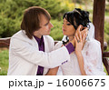 Couple love bride and groom posing sitting on wood 16006675