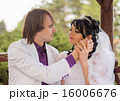 Couple love bride and groom posing sitting on wood 16006676