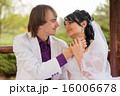 Couple love bride and groom posing sitting on wood 16006678