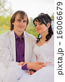 Couple love bride and groom posing sitting on wood 16006679