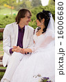 Couple love bride and groom posing sitting on wood 16006680