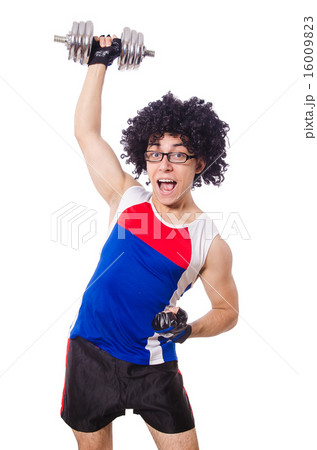Funny man exercising with dumbbells Funny man exercising with dumbbells 16009823