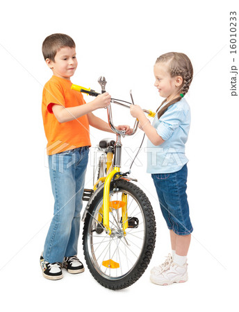 boy and girl repair bicycle isolated 16010233