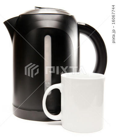 electric tea kettle on a white background and a mu electric tea kettle on a white background and a mu 16067744