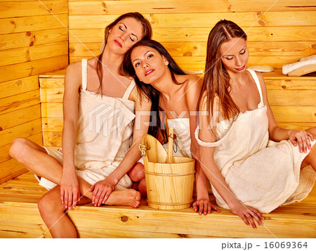 Woman relaxing in sauna. 16069364