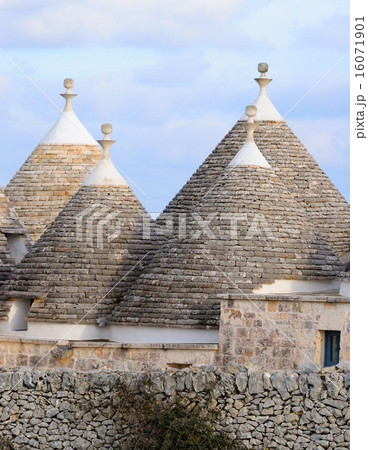 Characteristic trulli near countryside Alberobello Characteristic trulli near countryside Alberobello 16071901