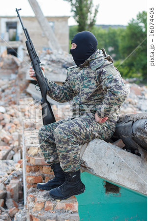 Military camouflage with a rifle 16074408