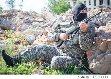 Military camouflage with a rifle 16074411