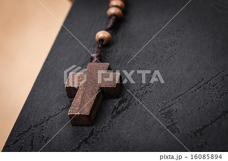 Christian cross necklace on Holy Bible book Christian cross necklace on Holy Bible book 16085894