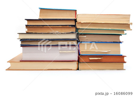 A stack of old books with bookmarks  16086099