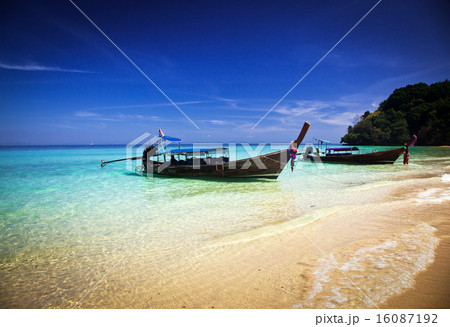 Longtail boats on the beautiful beach, Thailand 16087192