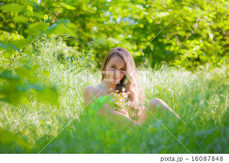 The young beautiful girl with long hair  16087848