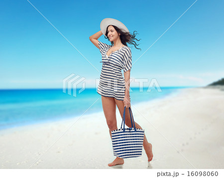 happy young woman in summer clothes and sun hat happy young woman in summer clothes and sun hat 16098060