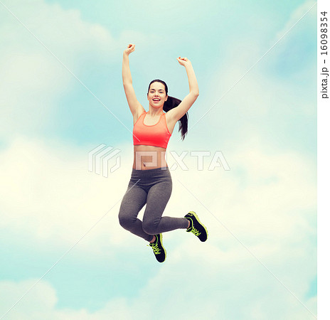 sporty teenage girl jumping in sportswear 16098354