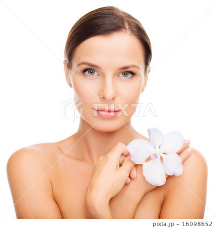 relaxed woman with orhid flower relaxed woman with orhid flower 16098652