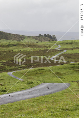 A winding road across open moorland countryside.  16101513