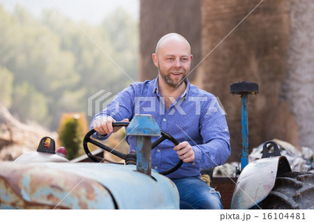 mechanic reparing old agrimotors at farm mechanic reparing old agrimotors at farm 16104481