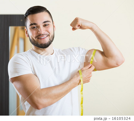 Guy checking fitness results 16105324