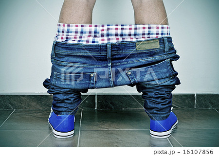 pants down boy young man with his pants down seen from behindの写真素材 [16107856] - PIXTA