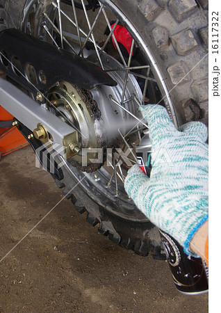 Enduro motorbike wheel and chain. Closeup shot 16117322