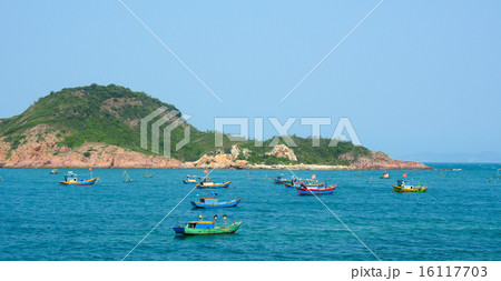 Tribal boats on beautiful beach 16117703