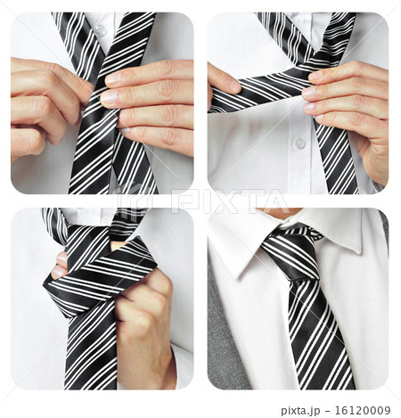 a man knotting his tie 16120009