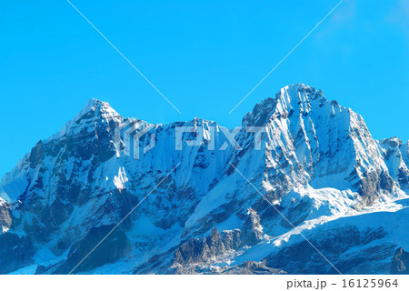 High mountains, covered by snow. 16125964