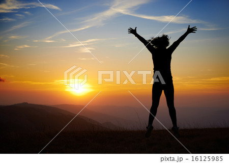 Young woman at sunset Young woman at sunset 16125985