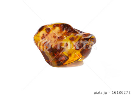 Amber stone from baltic on the white background 16136272