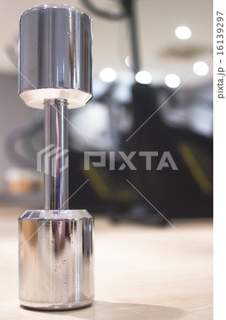 Dumbbell gym metal weights in gym health club Dumbbell gym metal weights in gym health club 16139297