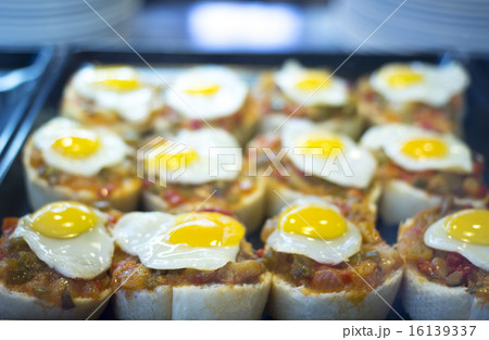 Spanish cusine egg tapas dishes in restaurant 16139337