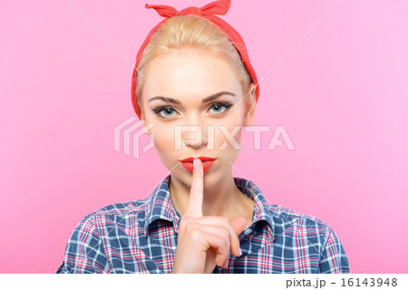 Beautiful pin up girl isolated on pink Beautiful pin up girl isolated on pink 16143948