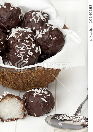 Coconut milk rice truffles with silver spoon 16146162